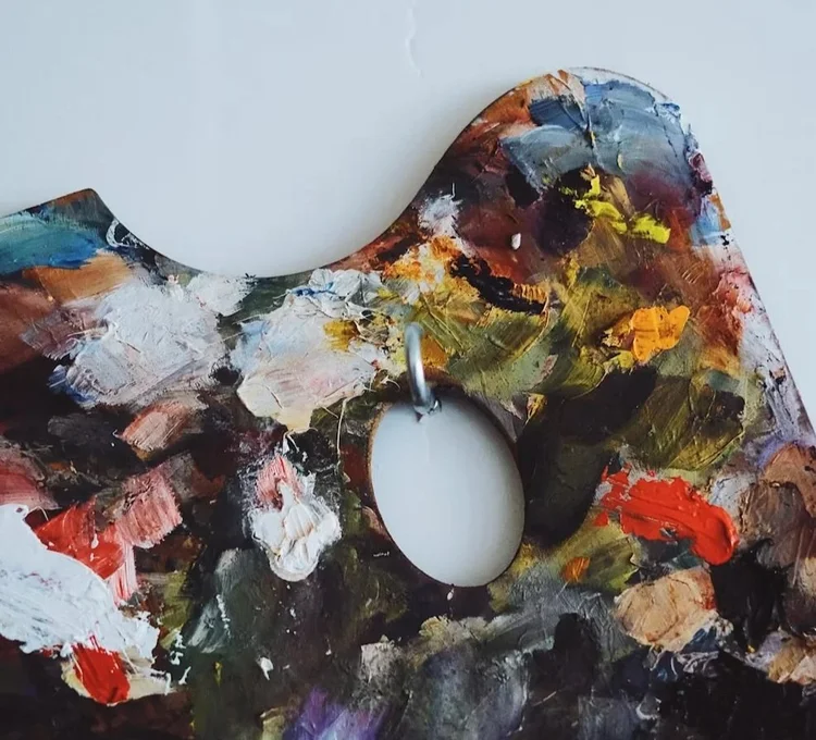 bits of paper with images of volcano and dots and figures
