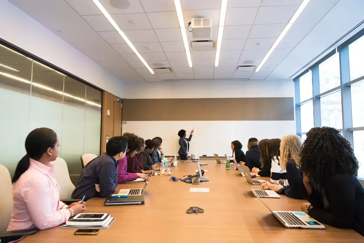Ini Augustine leading a meeting