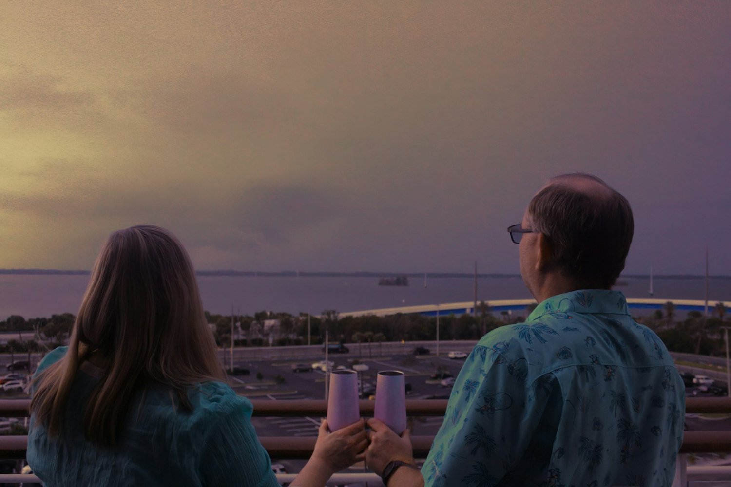 couple cruise sunset view