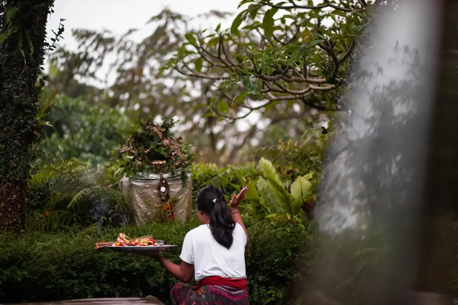 Balinese canang sari offering placed at the estate, a daily ritual of flowers, incense and prayer