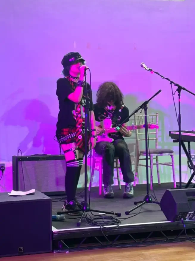 Two young people performing at Dreamland for youth pride