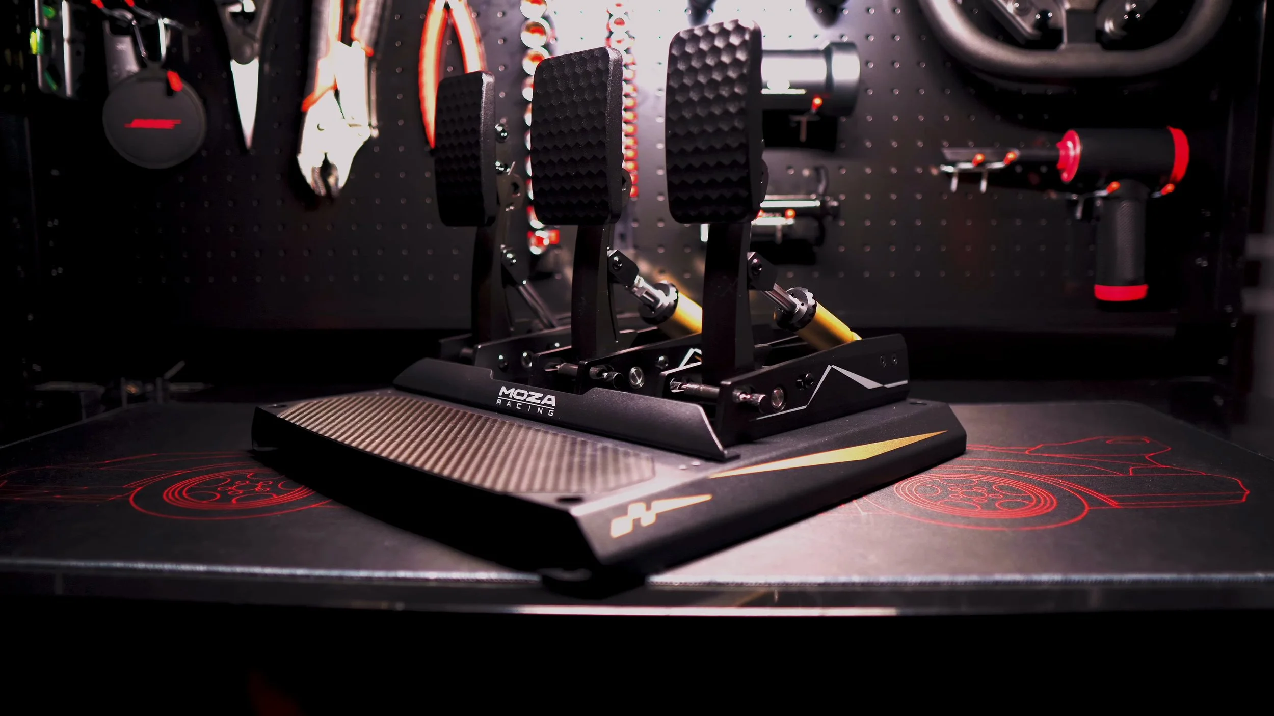 The complete pedal set and heel plate on the workbench.