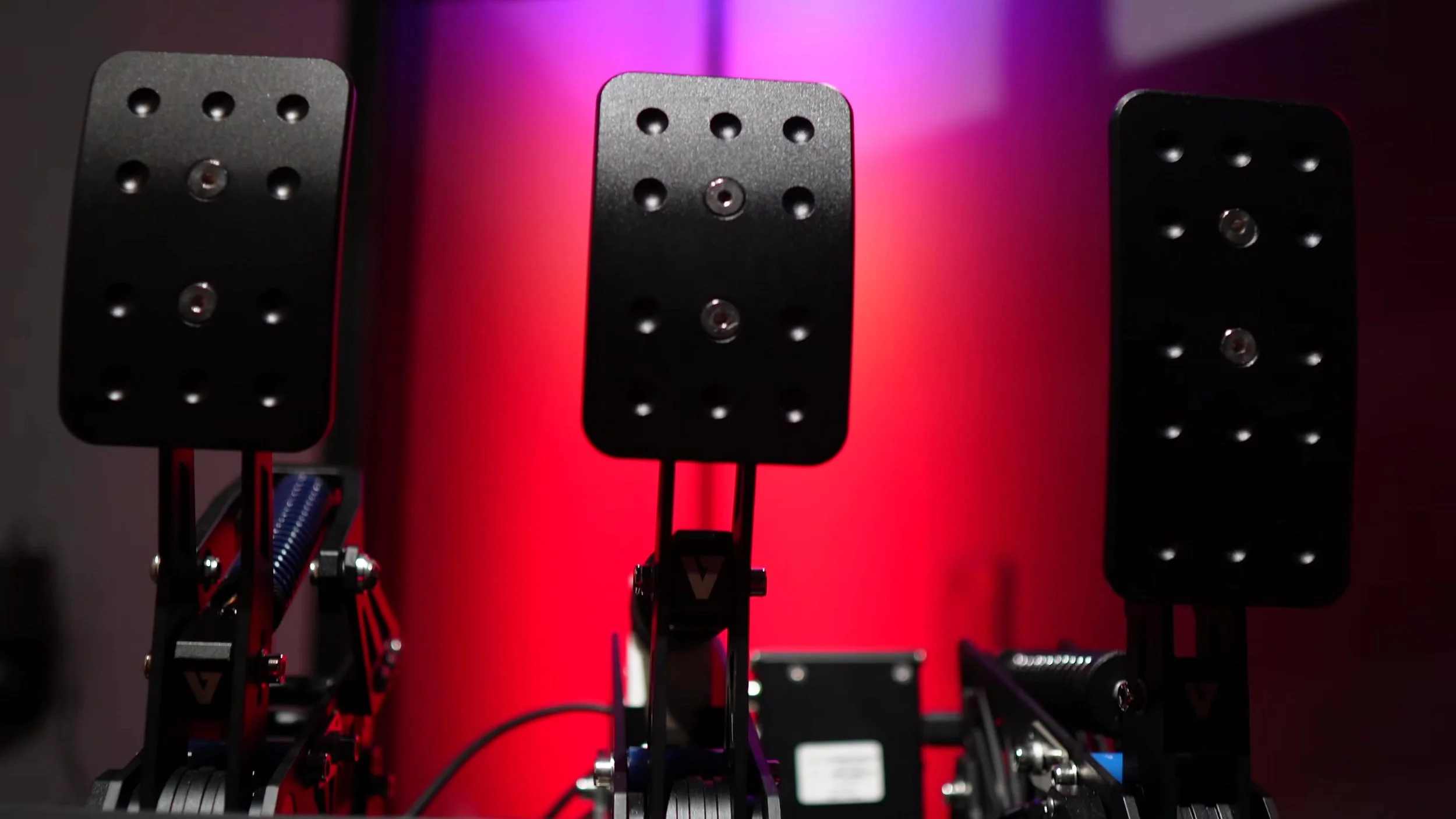 The three pedal faces viewed from the driving position.
