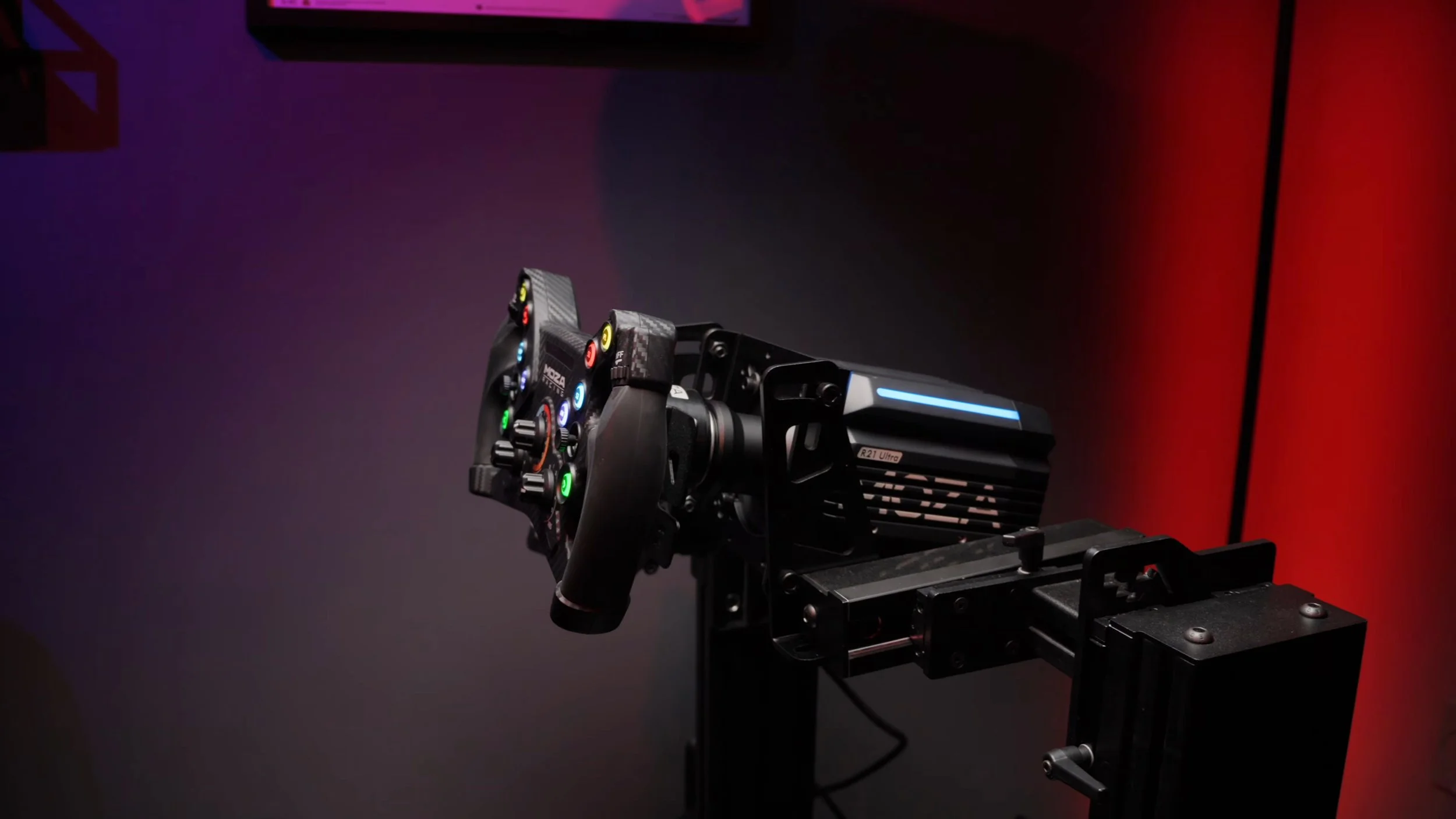 A side view of the mounted wheelbase and steering wheel.