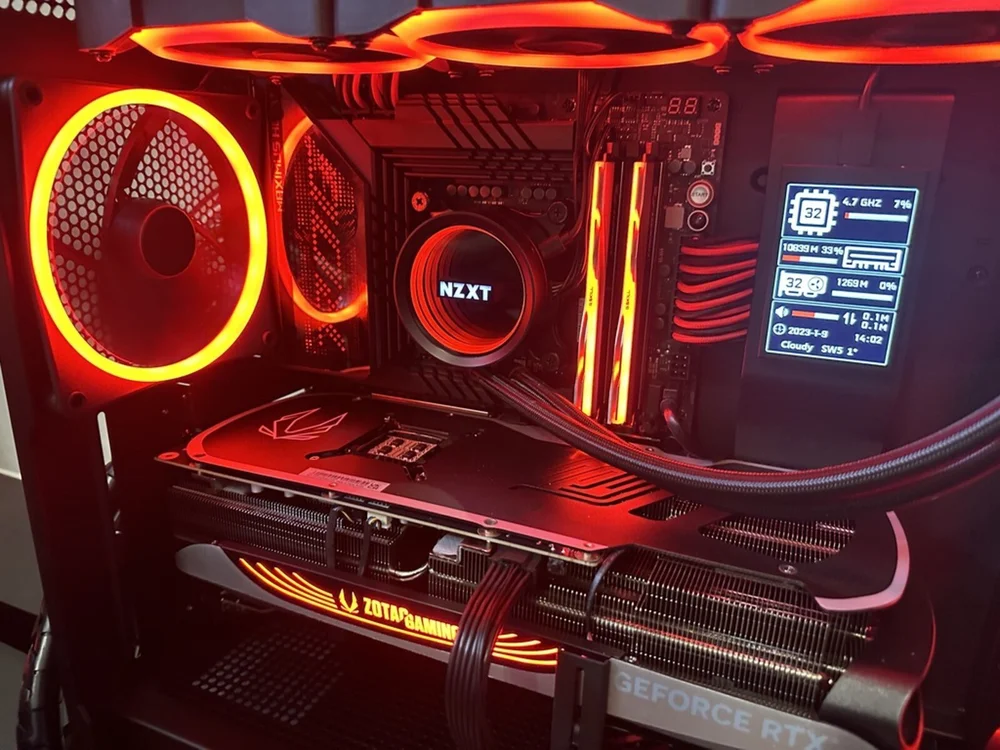 A later build with NZXT cooling and a ZOTAC graphics card