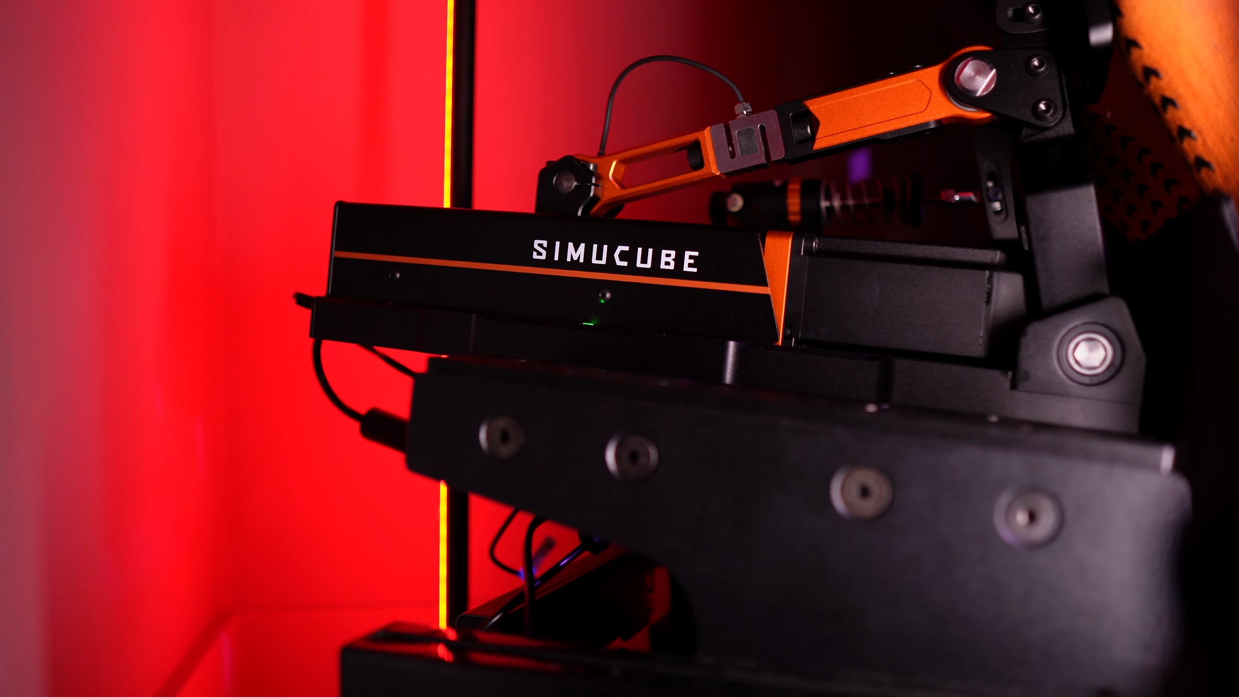 The orange-linkage pedal alongside the installed hardware.