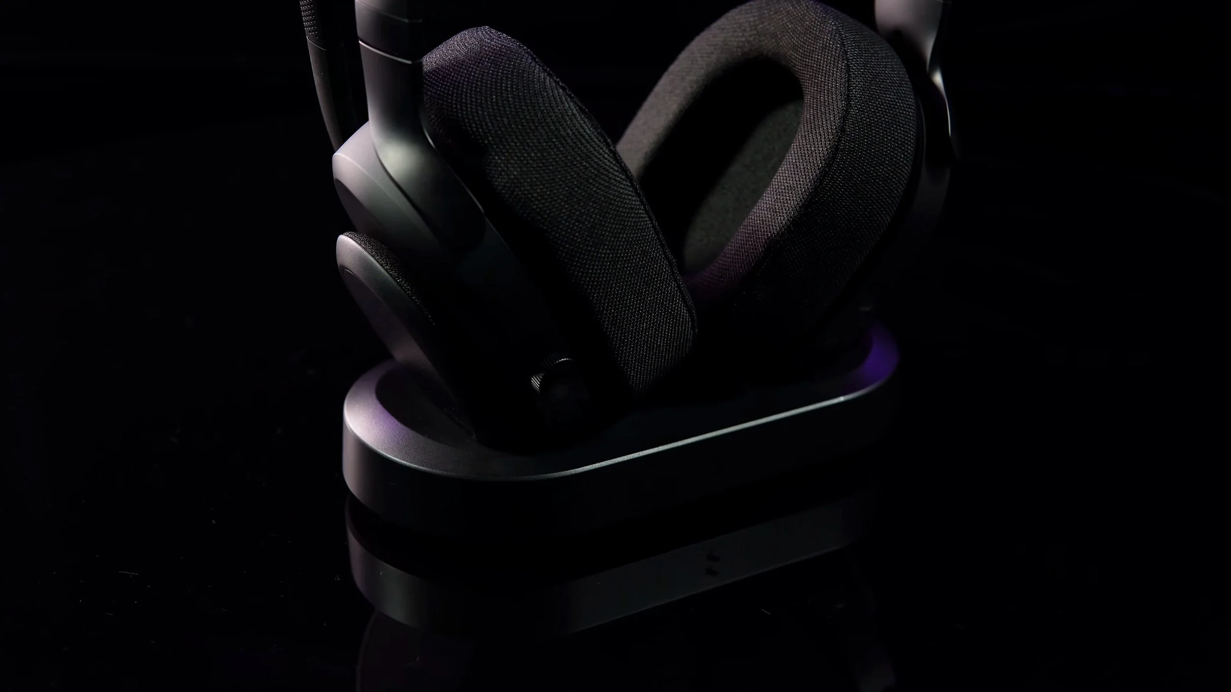 The headset resting in its charging dock.