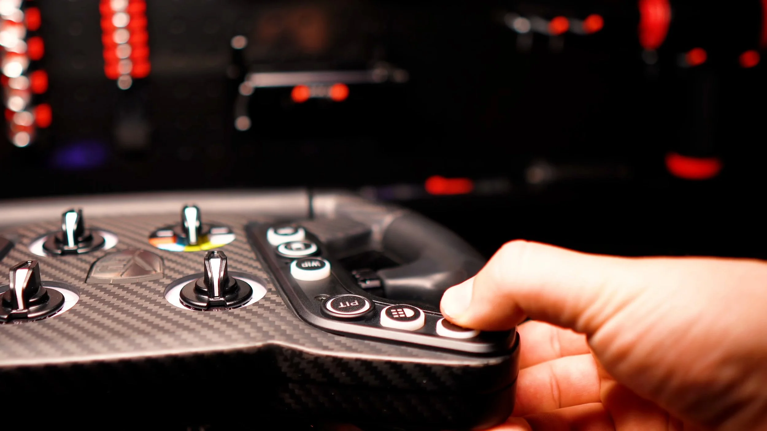 Operating one of the front buttons.