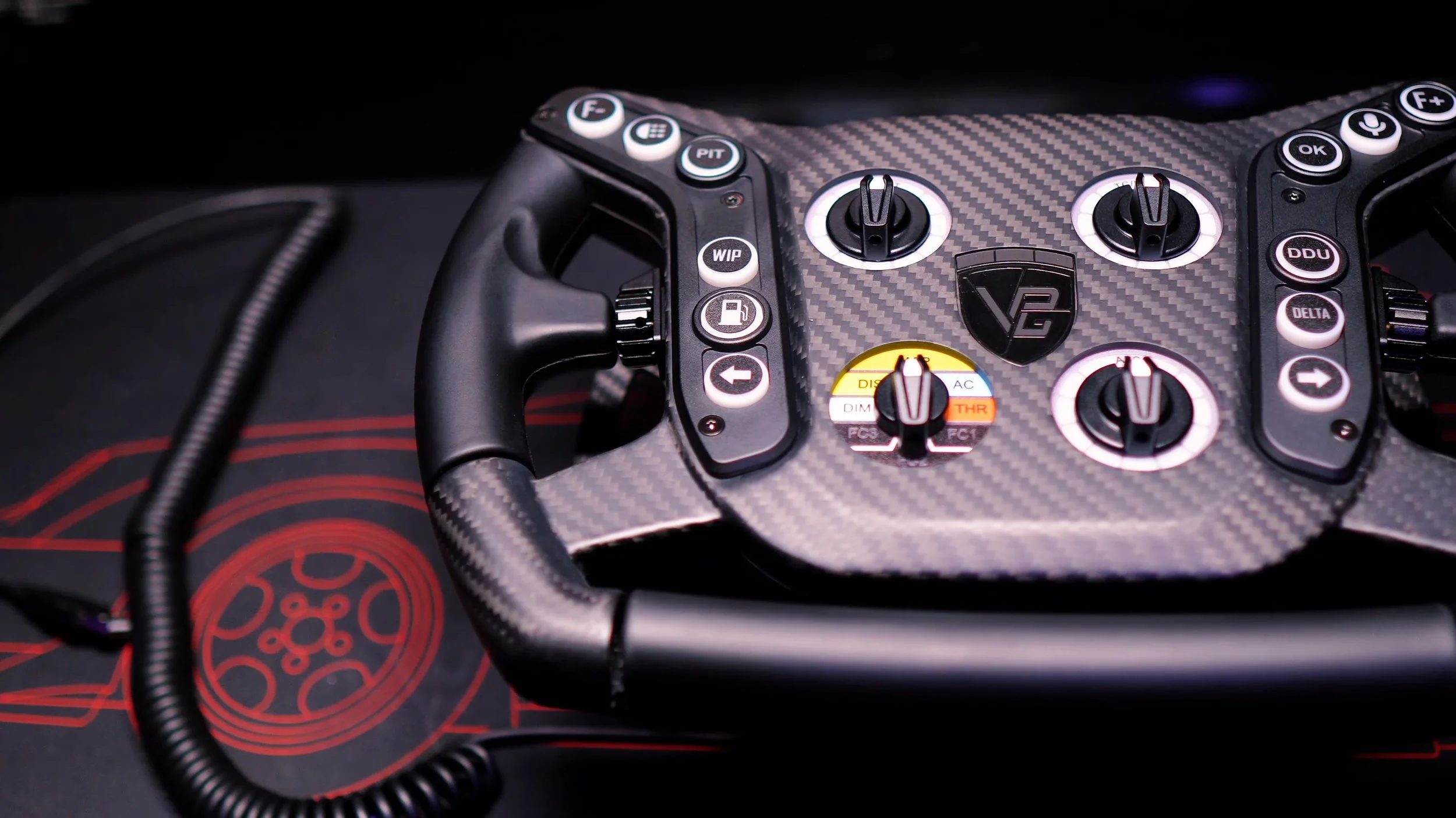 The V-PGT front plate and grips on the workbench.