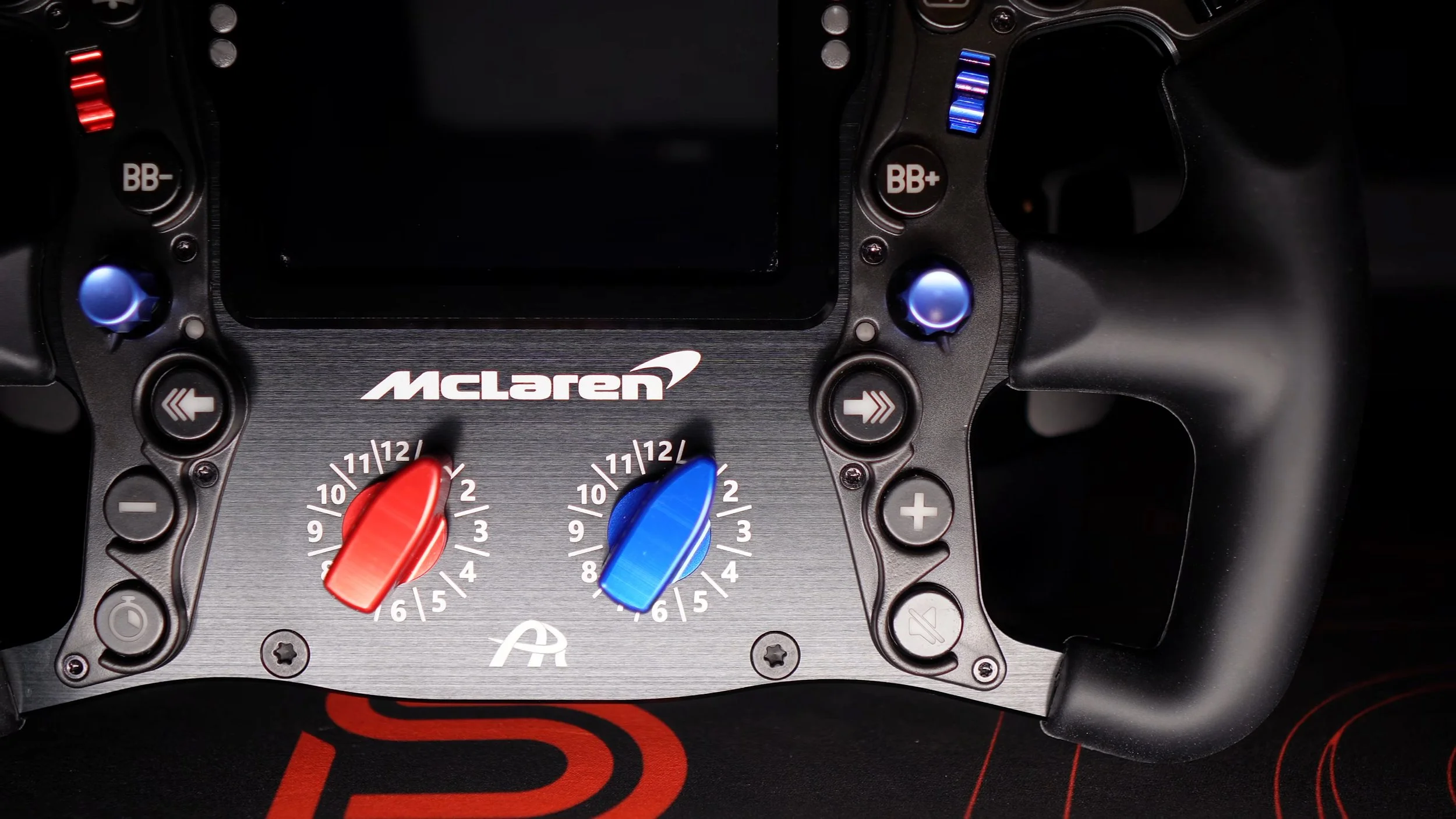 A closer look at the rotary selectors and grip.