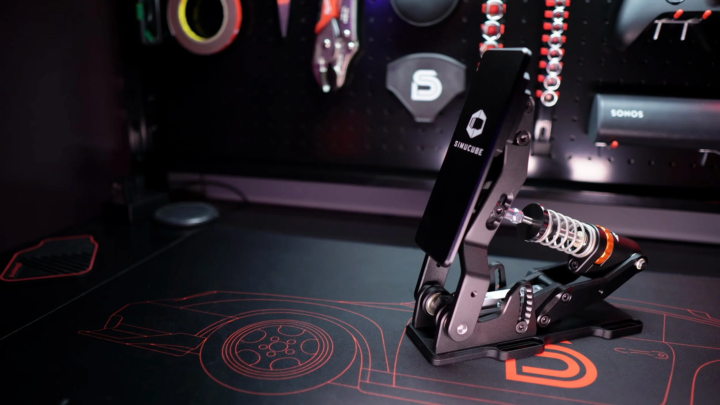 The complete throttle pedal on the workbench.
