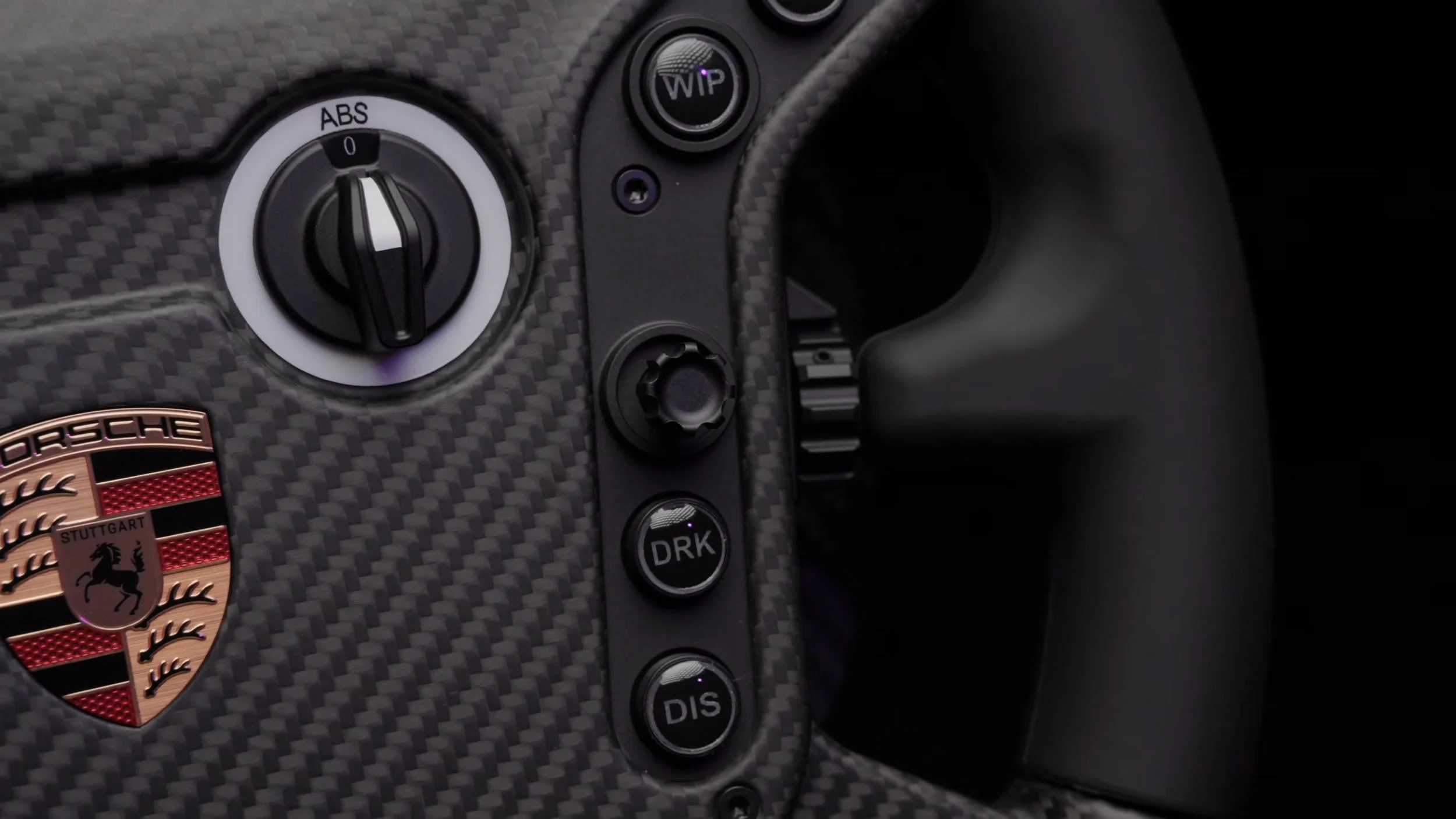 A closer look at the rotary control and labelled buttons.