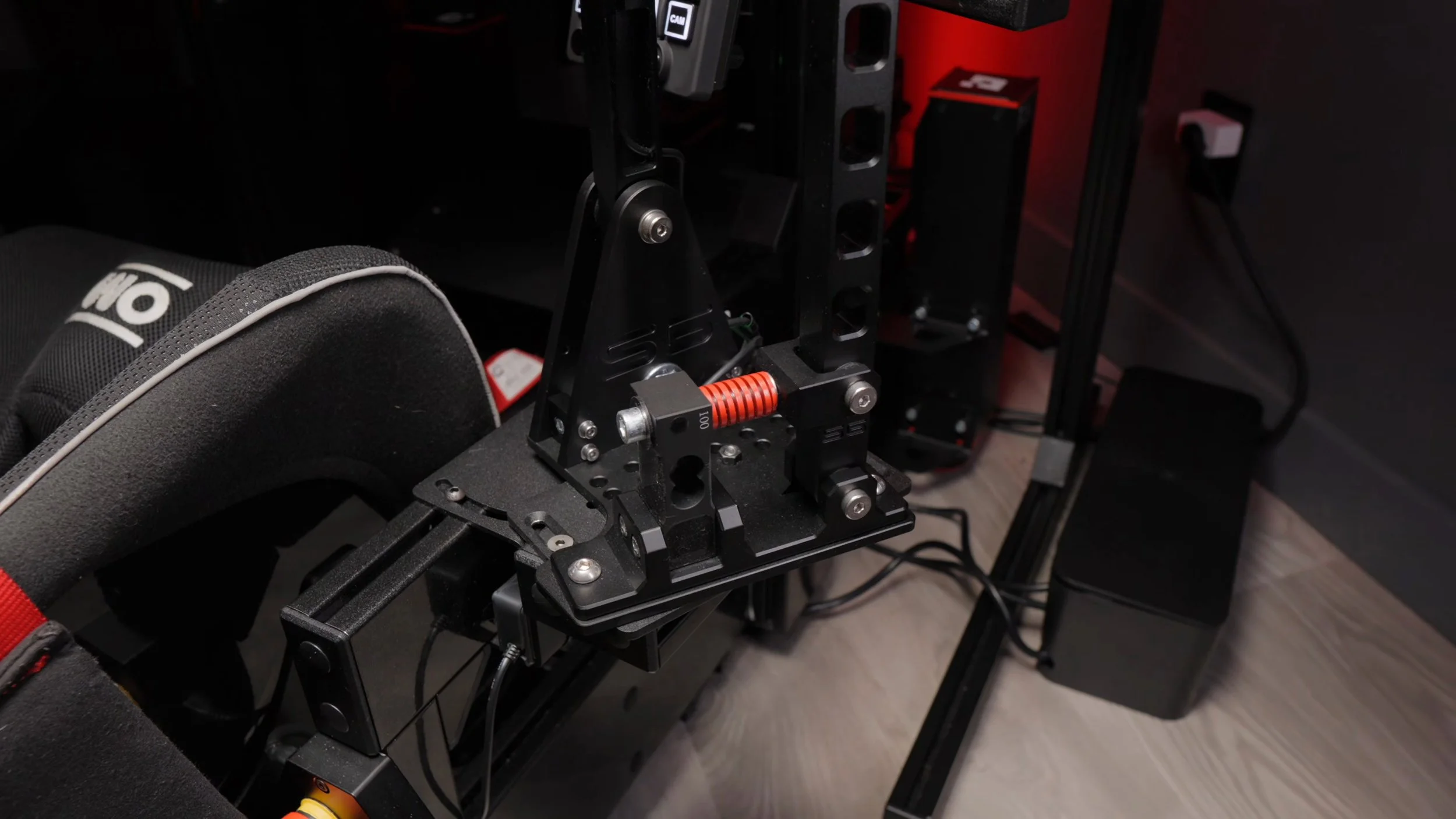 The mechanism and mounting arrangement beside the seat.