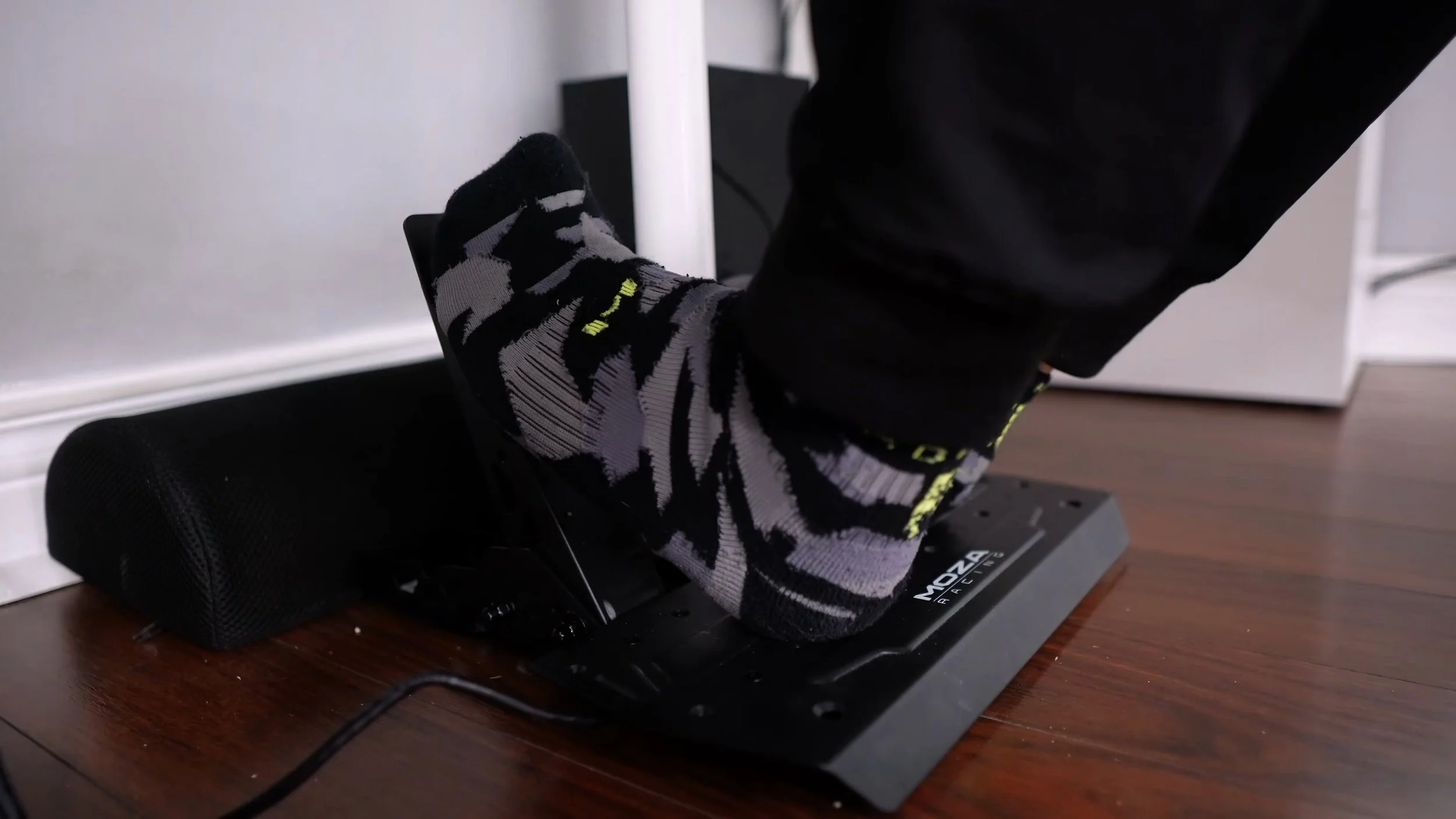 The pedals in use beneath the desk.