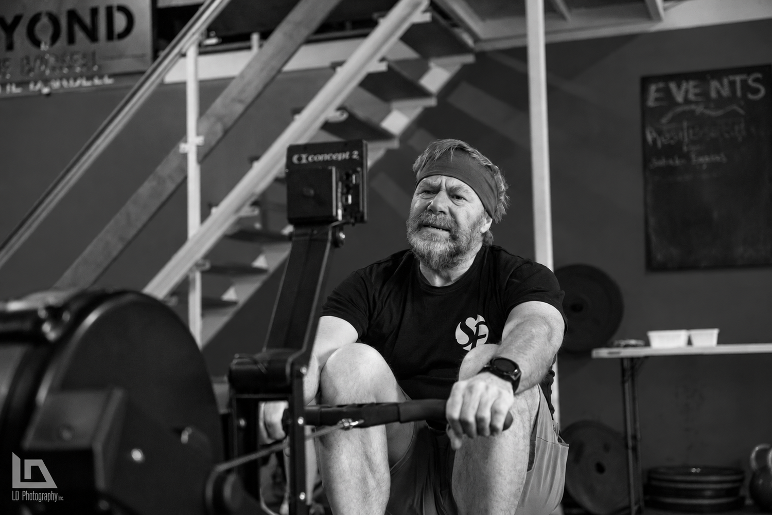 A Solace member working on the rowing machine.