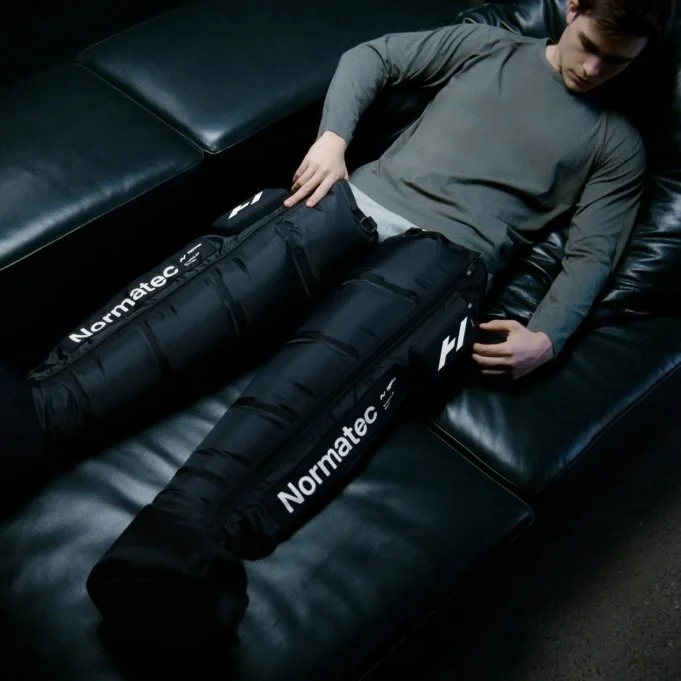 Hyperice Normatec Elite recovery boots used for leg compression recovery