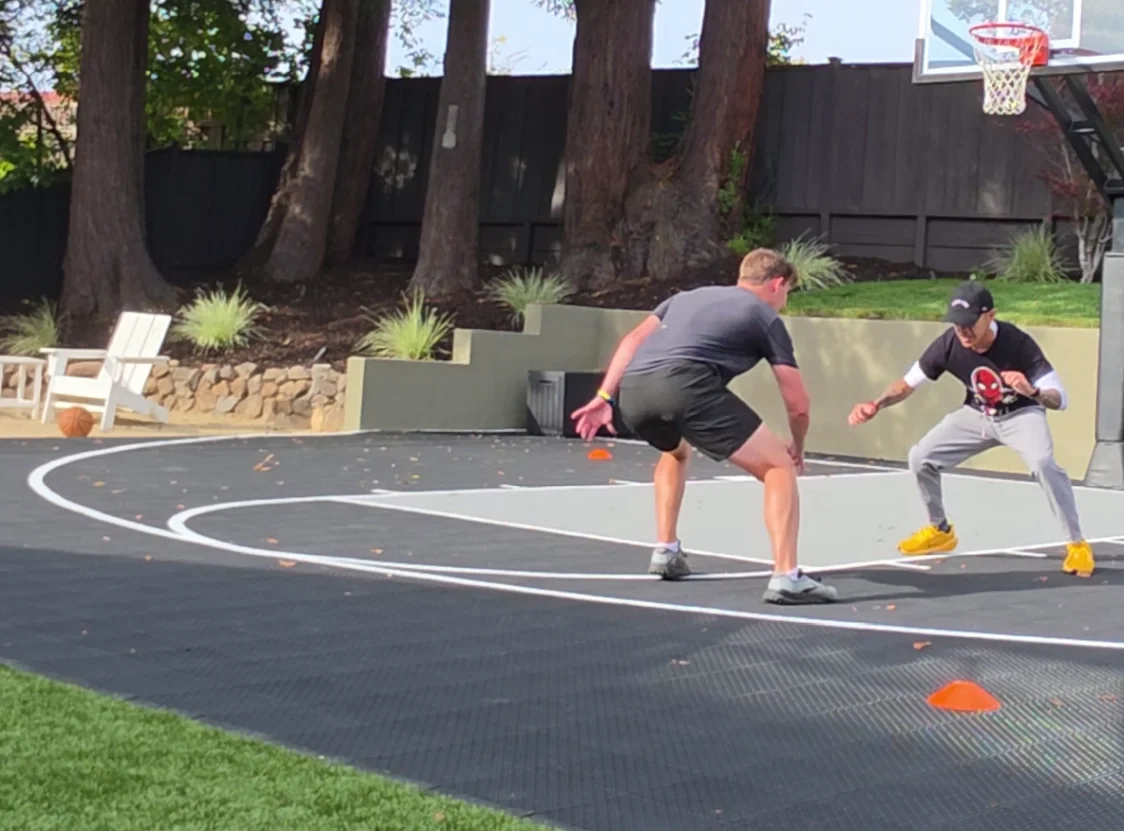 Athlete training outdoors during performance physical therapy