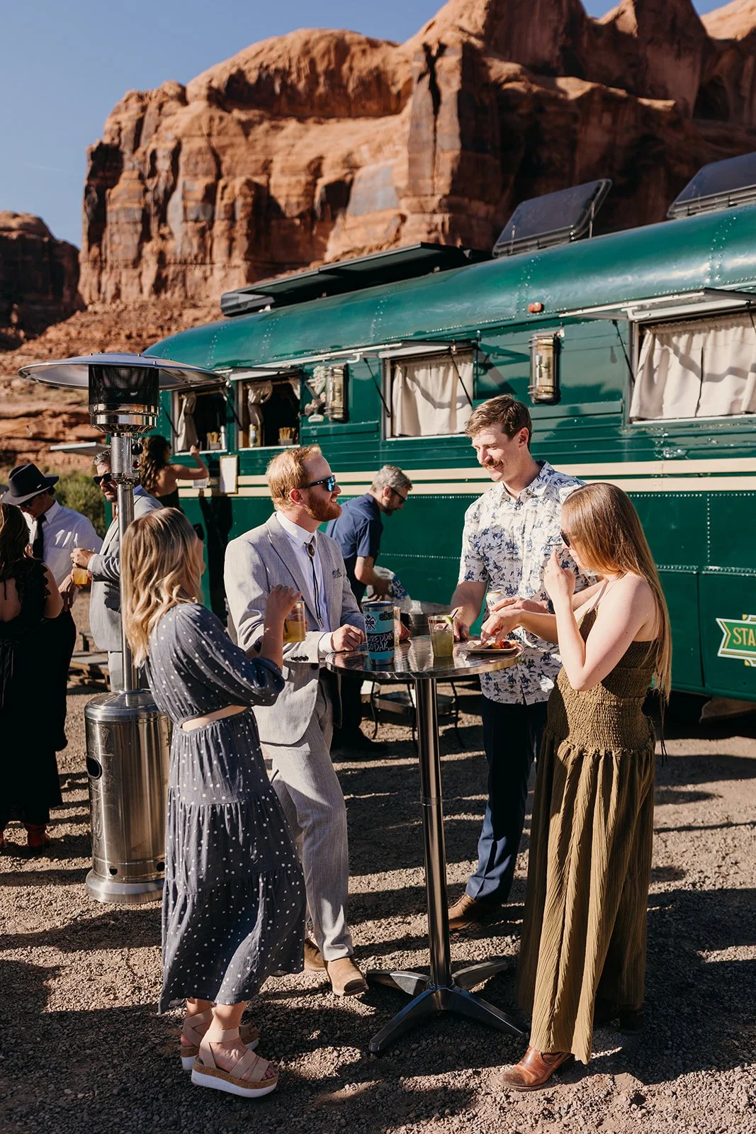 Welcome cocktails poured against Moab's red rock backdrop