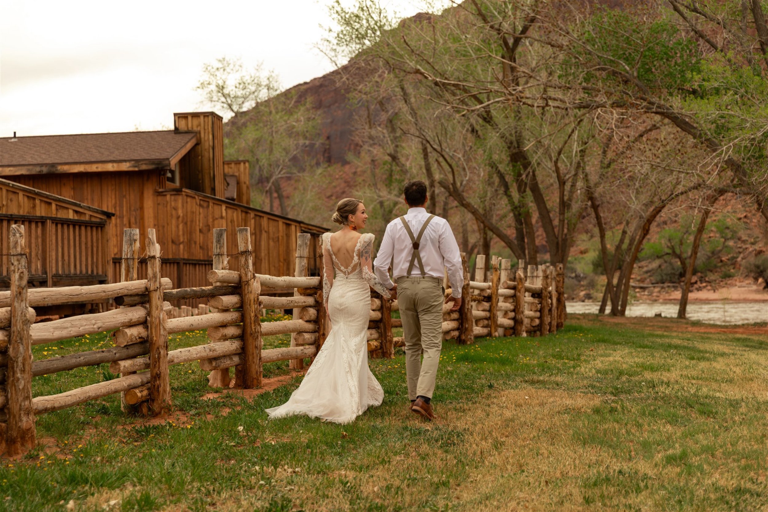 A wildflower meadow tucked into the Red Cliffs Lodge property at golden hour — a hidden gem suited to an intimate welcome party