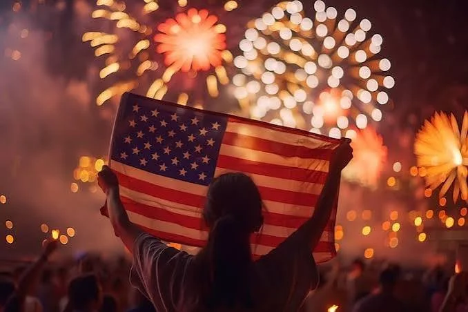 American flag displayed during an Independence Day fireworks celebration