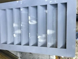 Front of a gable louver before installation
