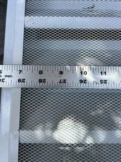 Reverse side of the gable louver showing its screen