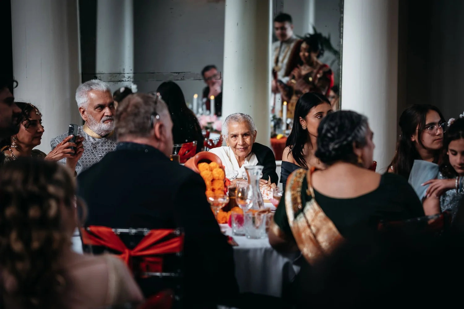 Guests seated for the wedding breakfast in the dining room at Lartington Hall