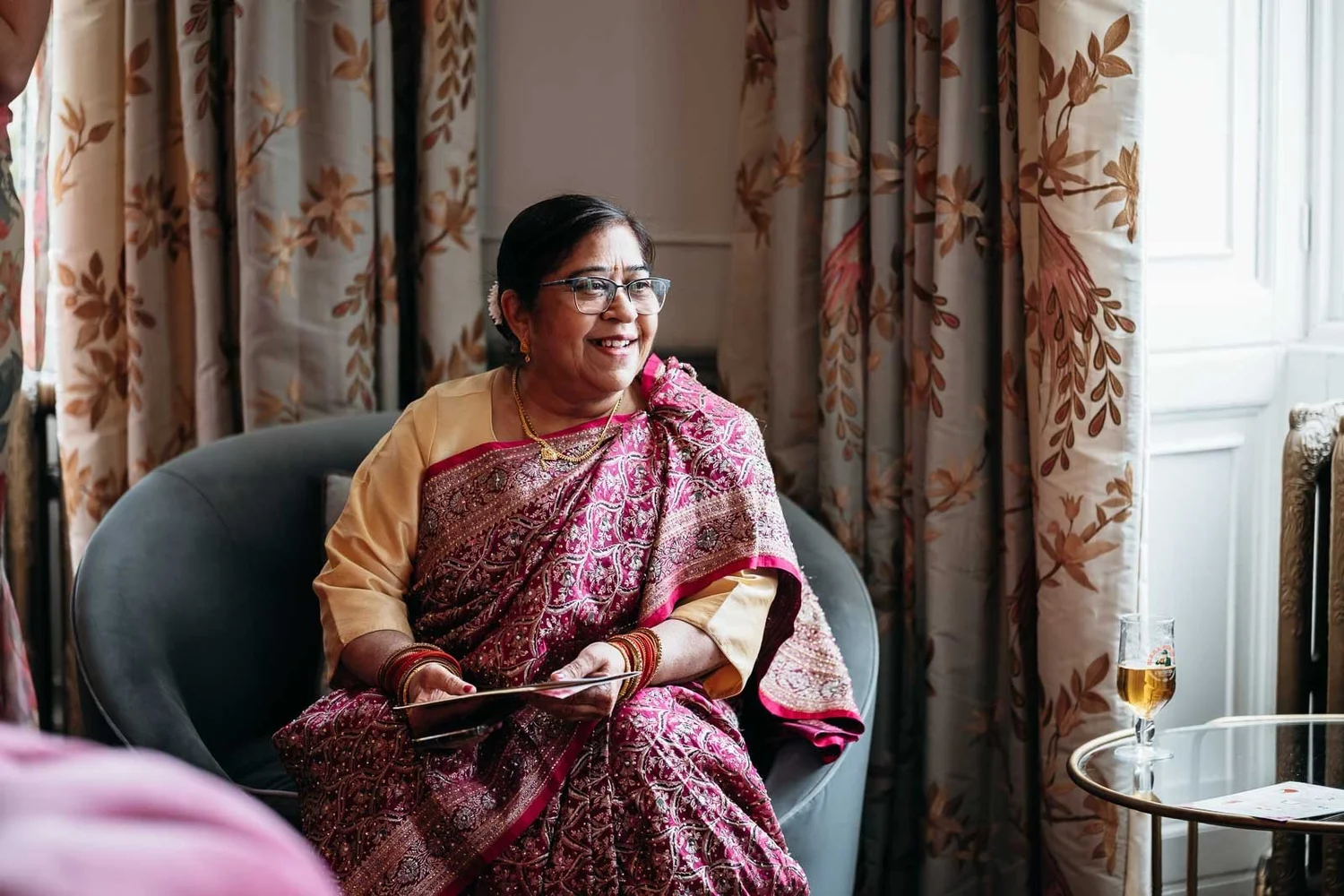 Bride’s mum sitting quietly in the drawing room at Lartington Hall