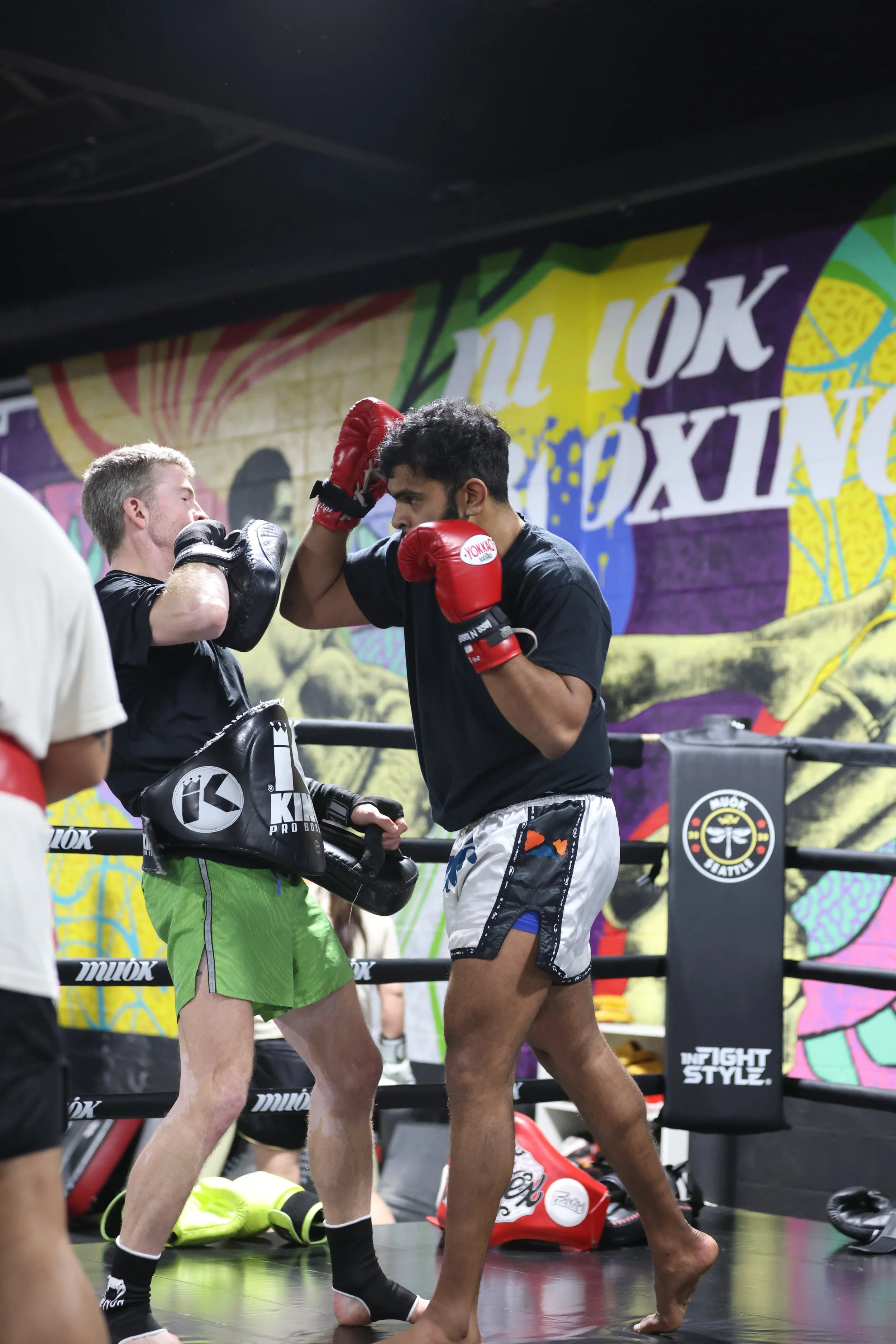 Muay Thai pad work clinching shoulder injuries Muok Boxing Georgetown Seattle