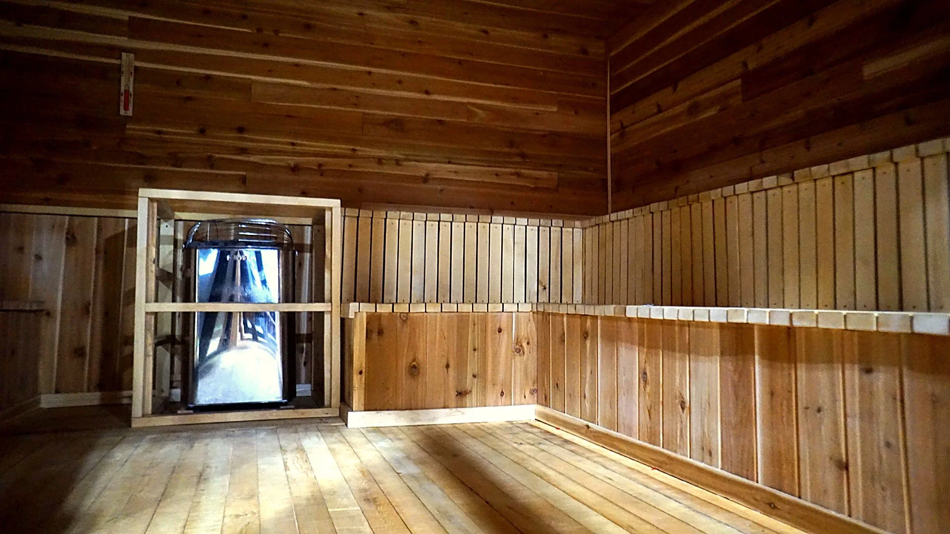 Cedar bench seating inside the sauna at Root Strength Georgetown