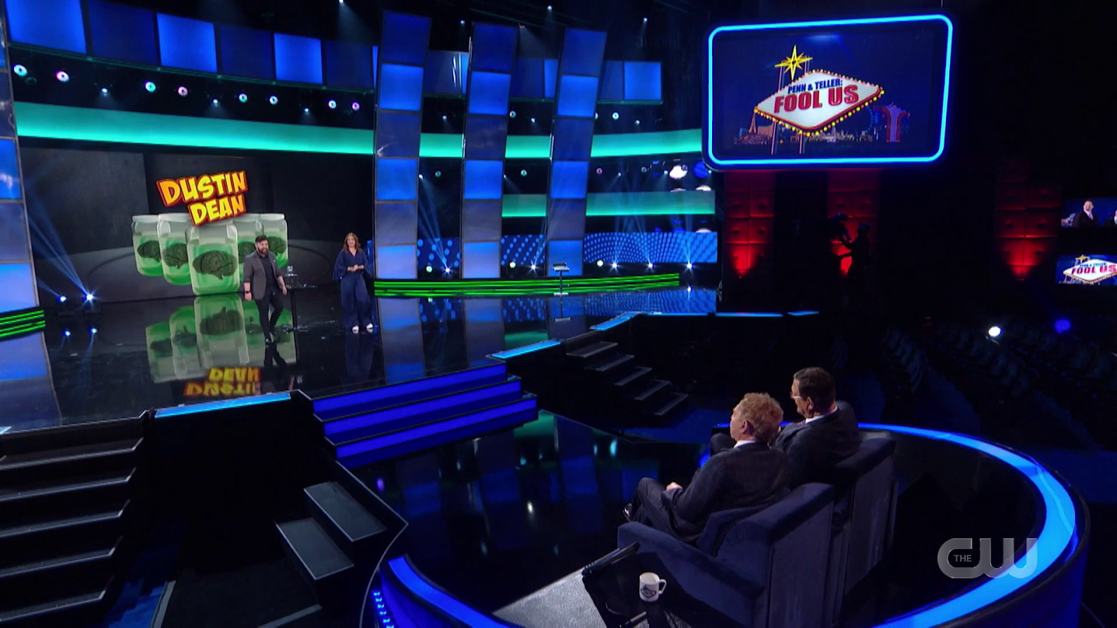 Dustin Dean performing on the Penn & Teller: Fool Us television stage