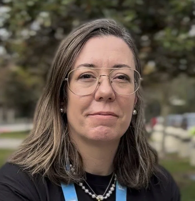 R. Erin Comninaki