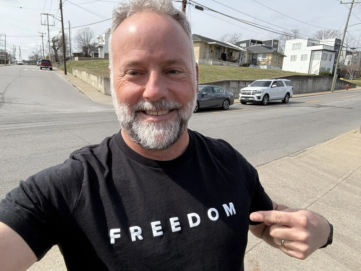 Scott on a Nashville street in a Freedom shirt