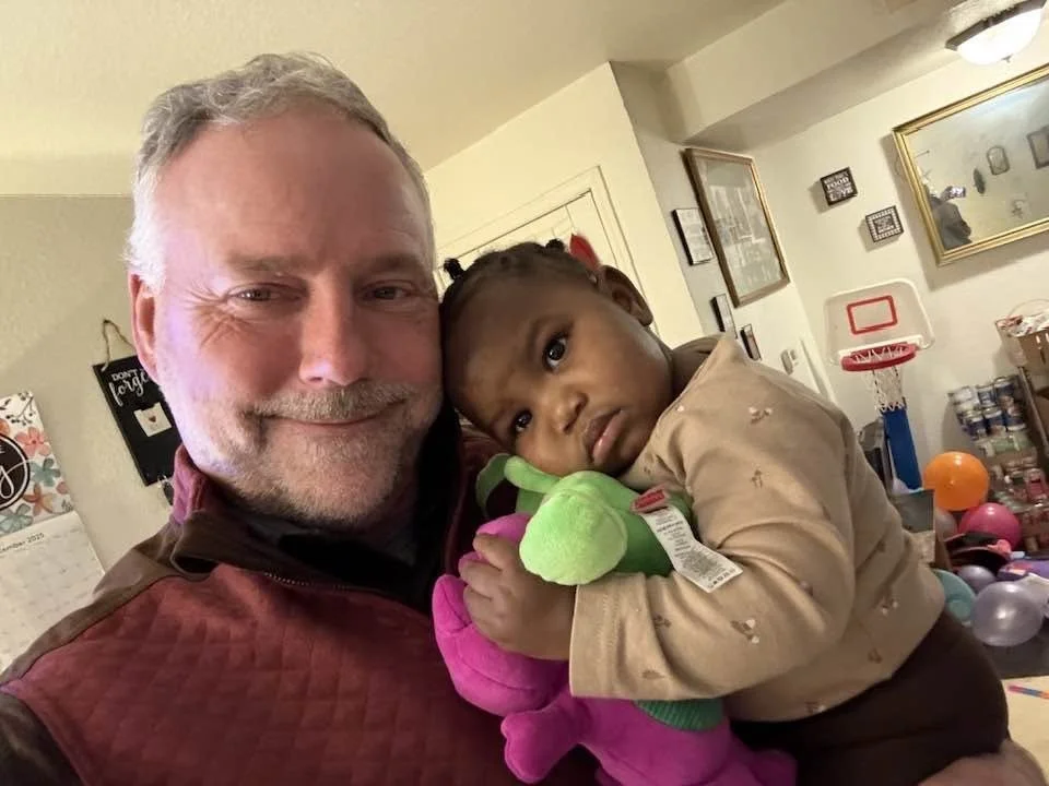 Scott holding Brielle