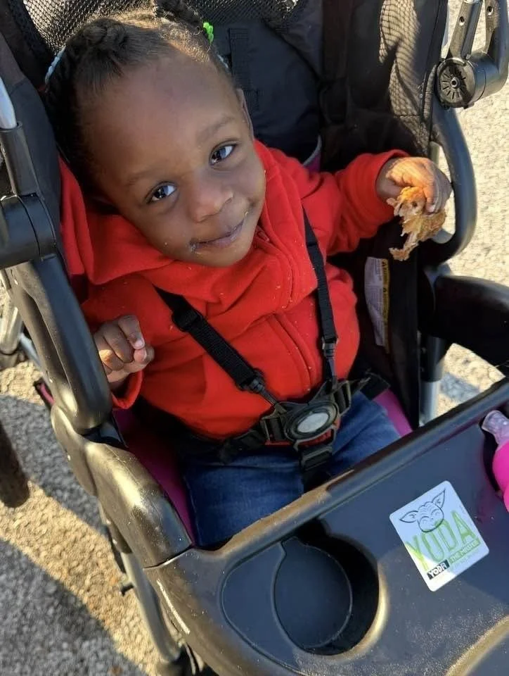 Bella in her stroller