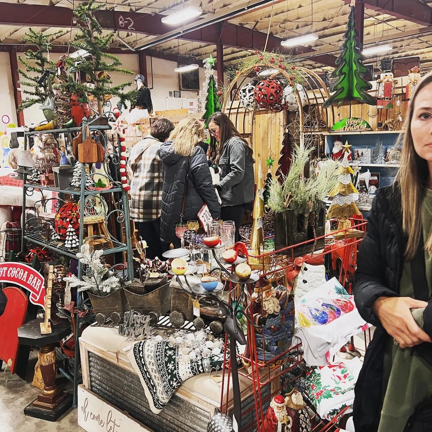 Shoppers wandering through a Rebel Junk market
