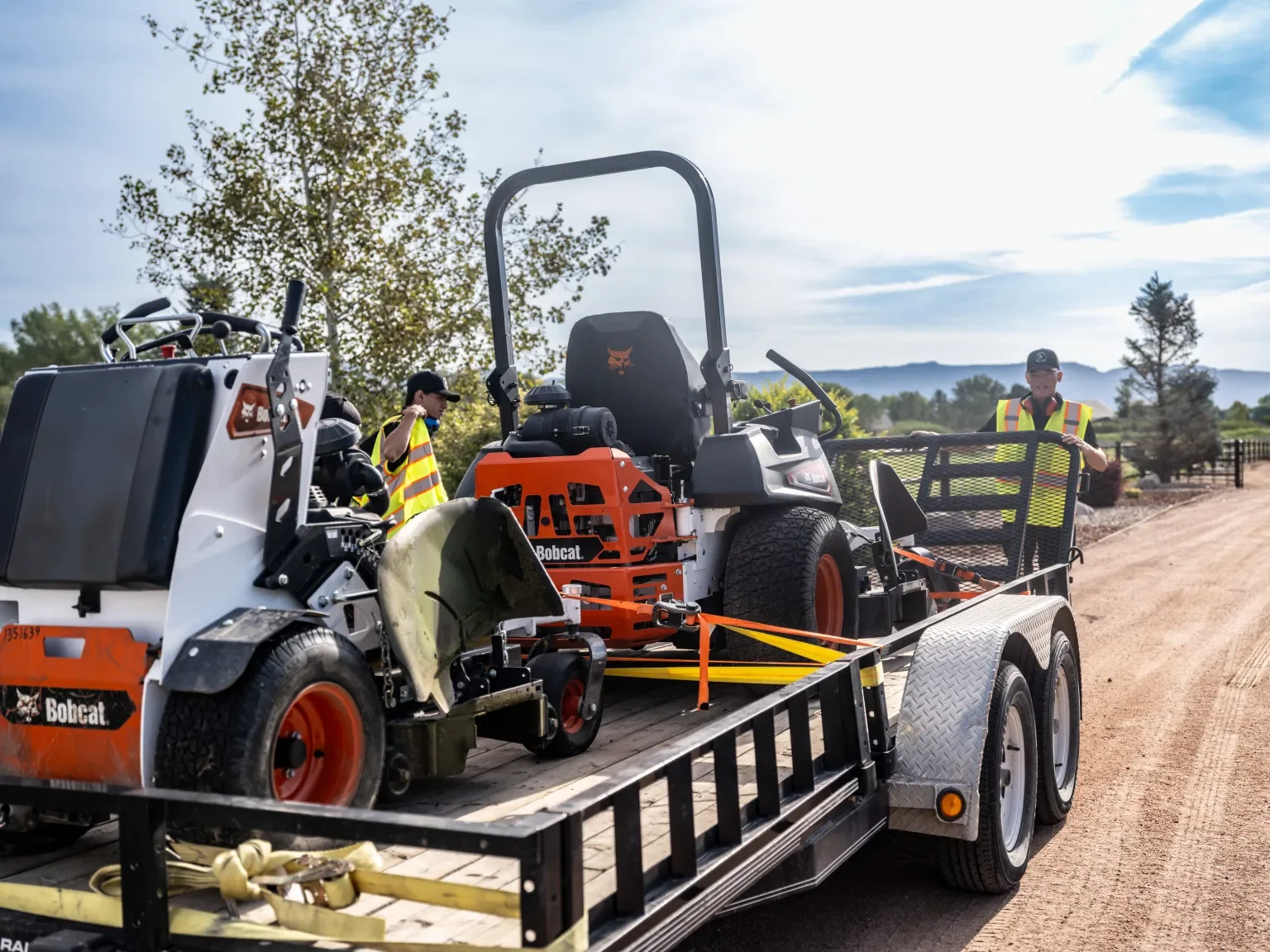 Roadkill Landscaping crew with Bobcat equipment