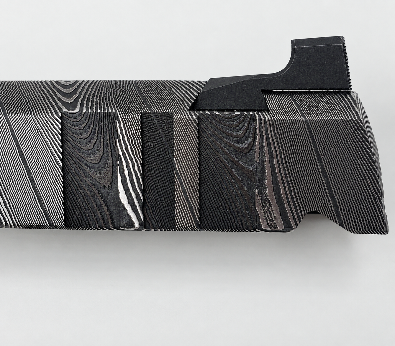 GA911 rear slide serrations inspired by the Twin Towers