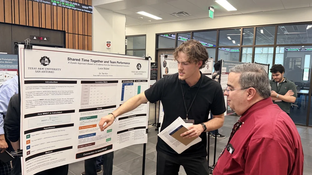 Luca presenting his research poster at Texas A&M University–San Antonio