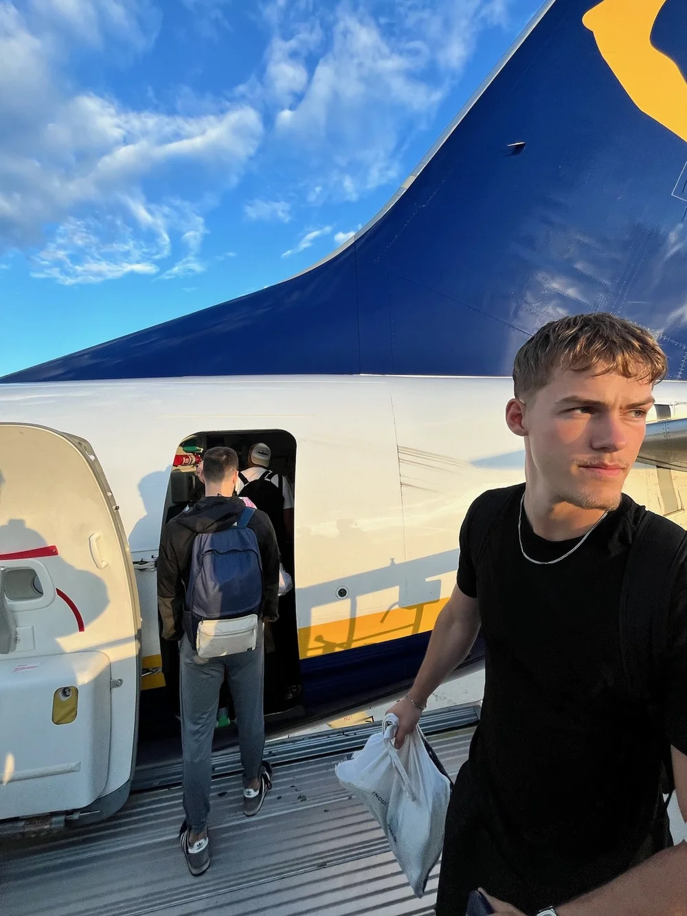 Luca boarding a plane