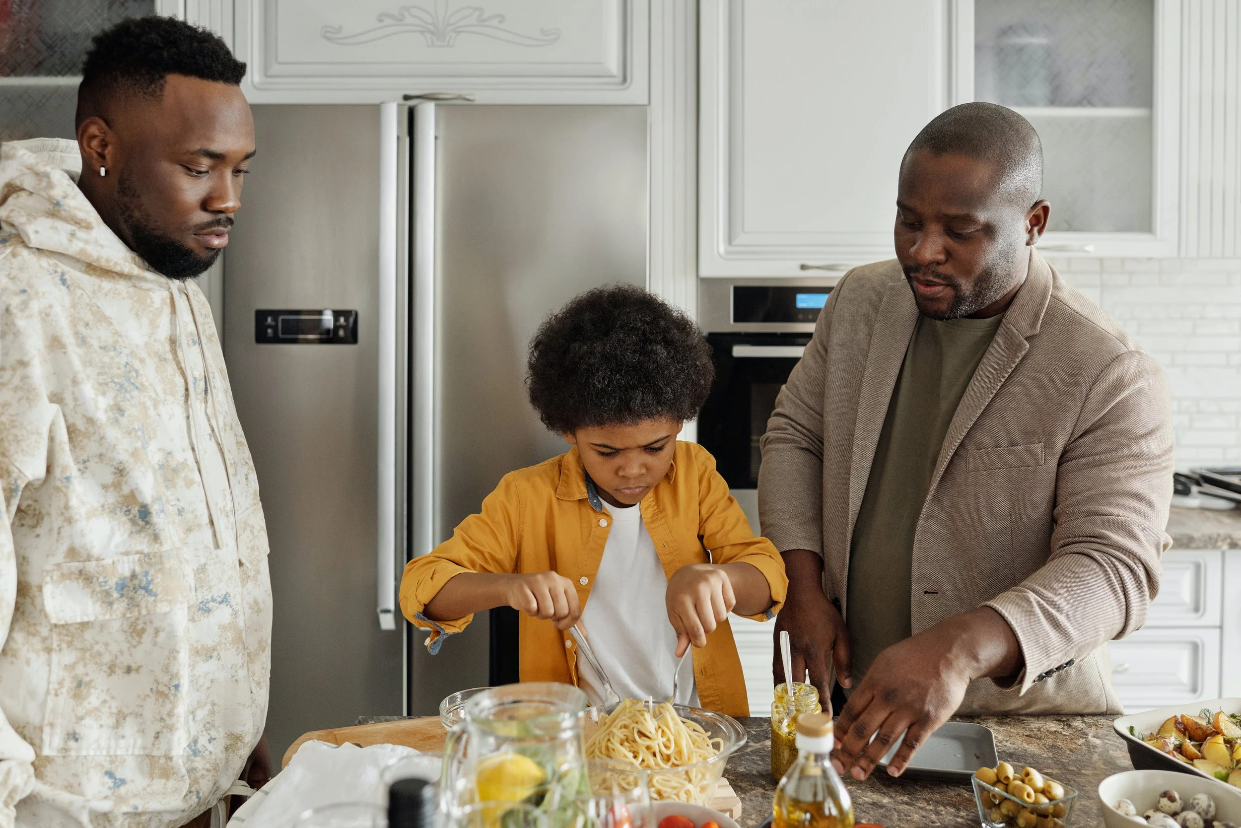 Black family cooking food