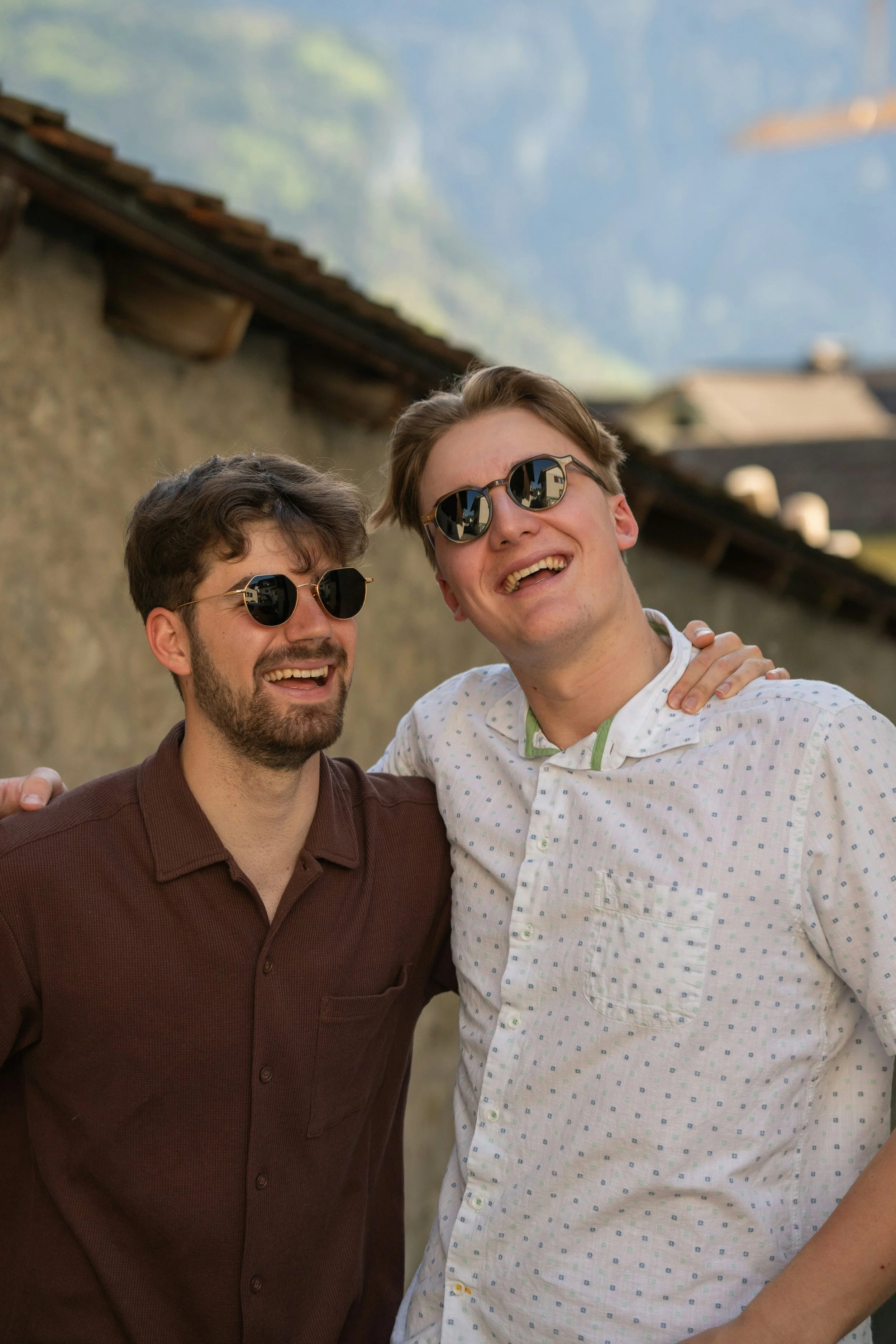 Two men smiling together
