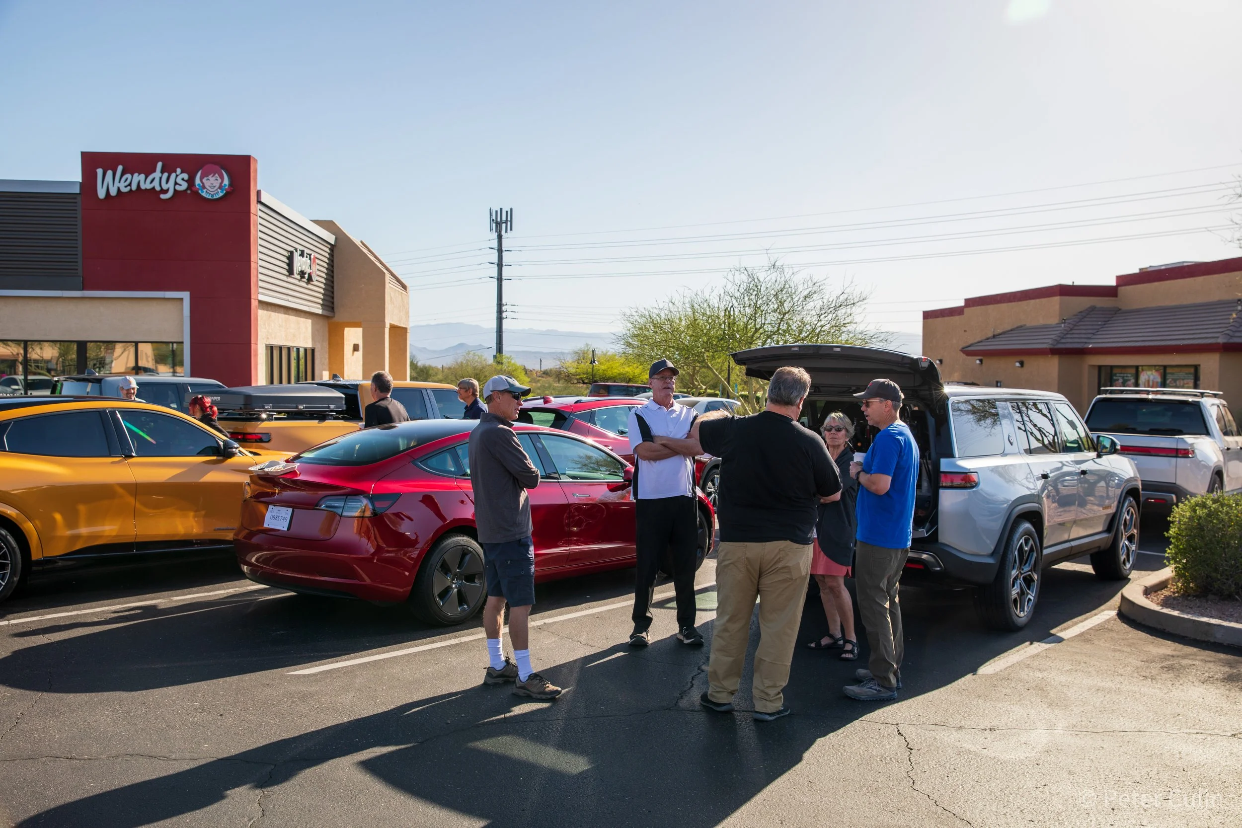 Electric vehicles displayed at an Arizona community event