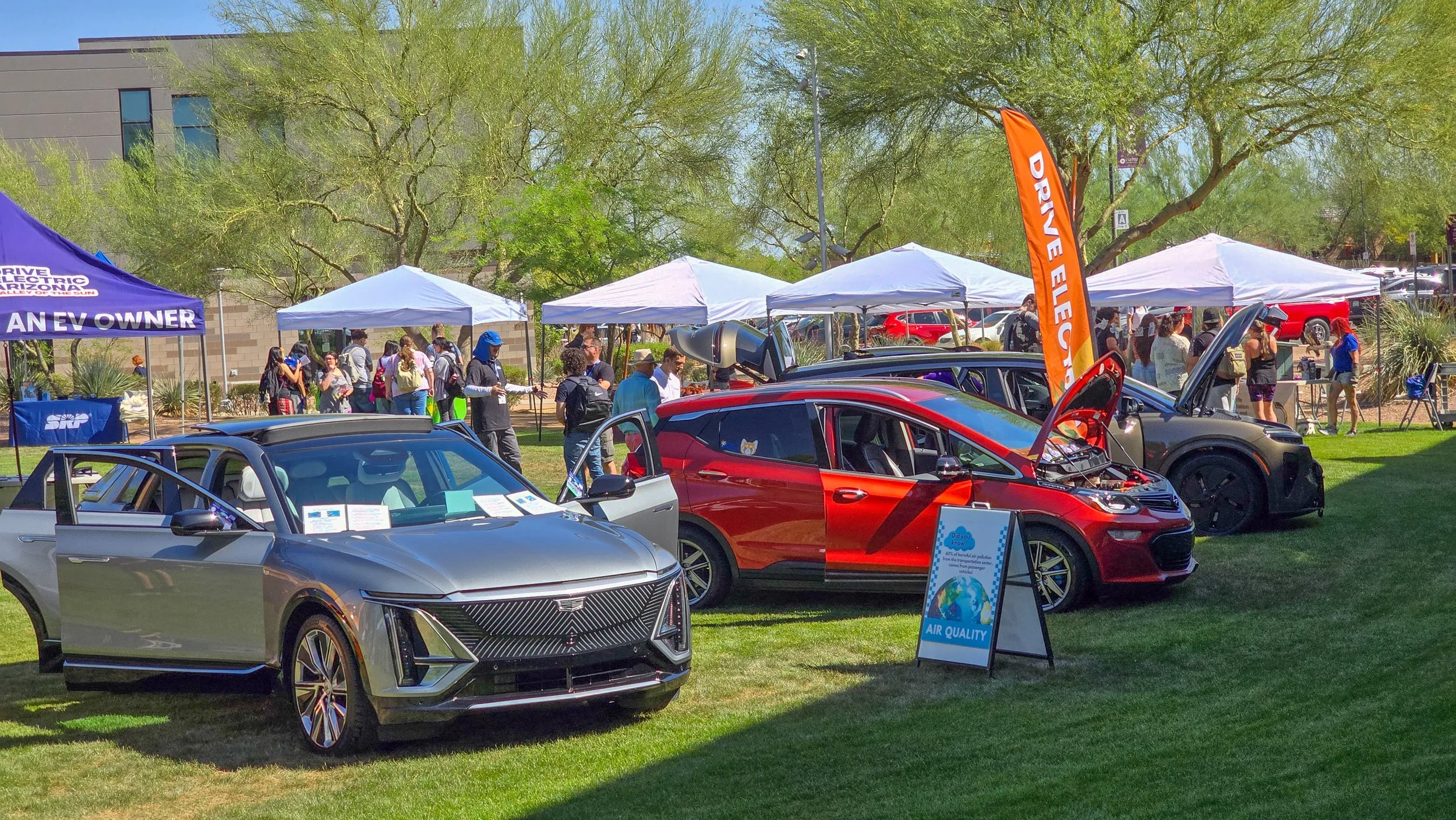Electric vehicles displayed at an Arizona community event