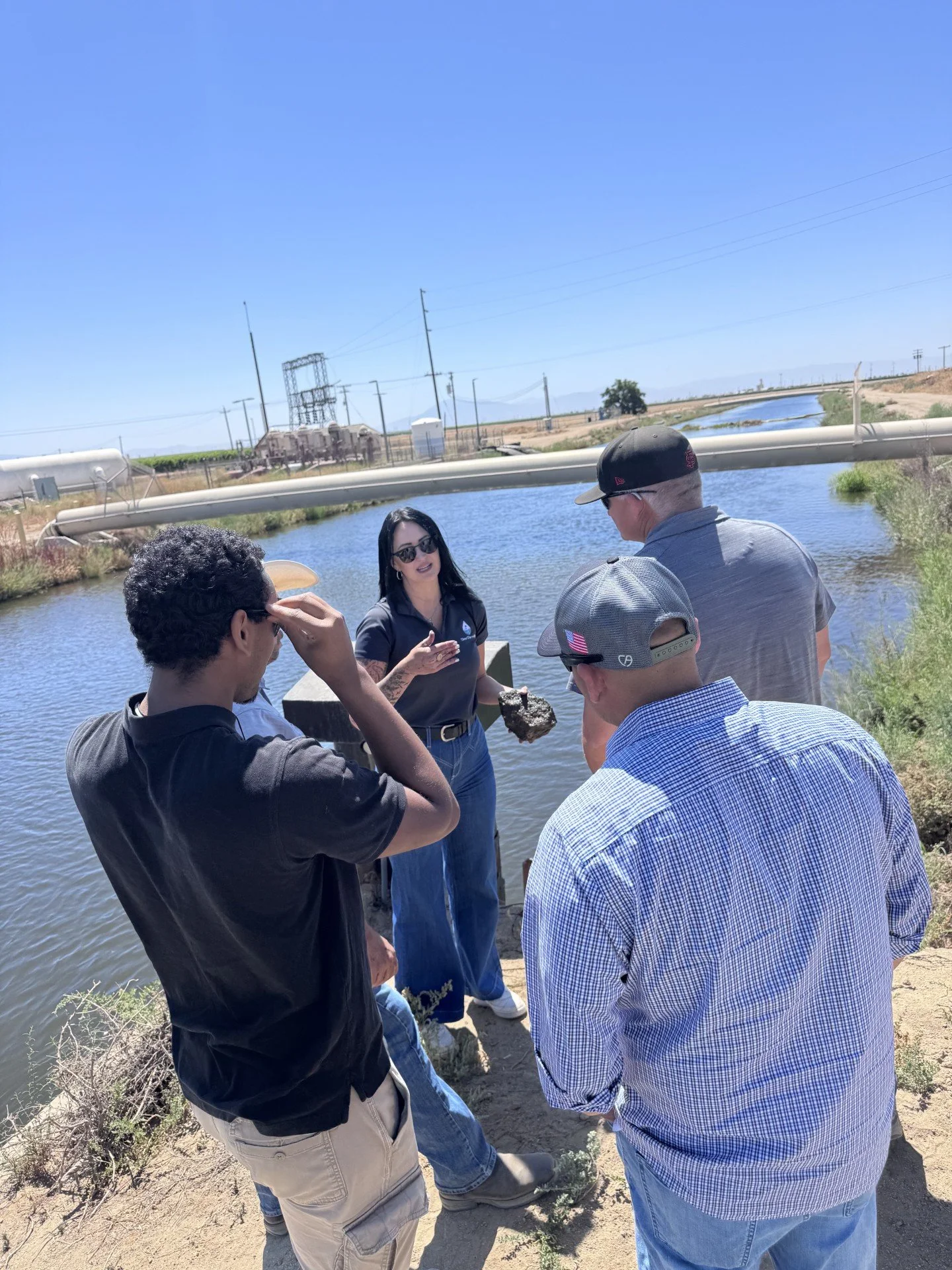 Aspen Kenyon discussing golden mussels during a California field project