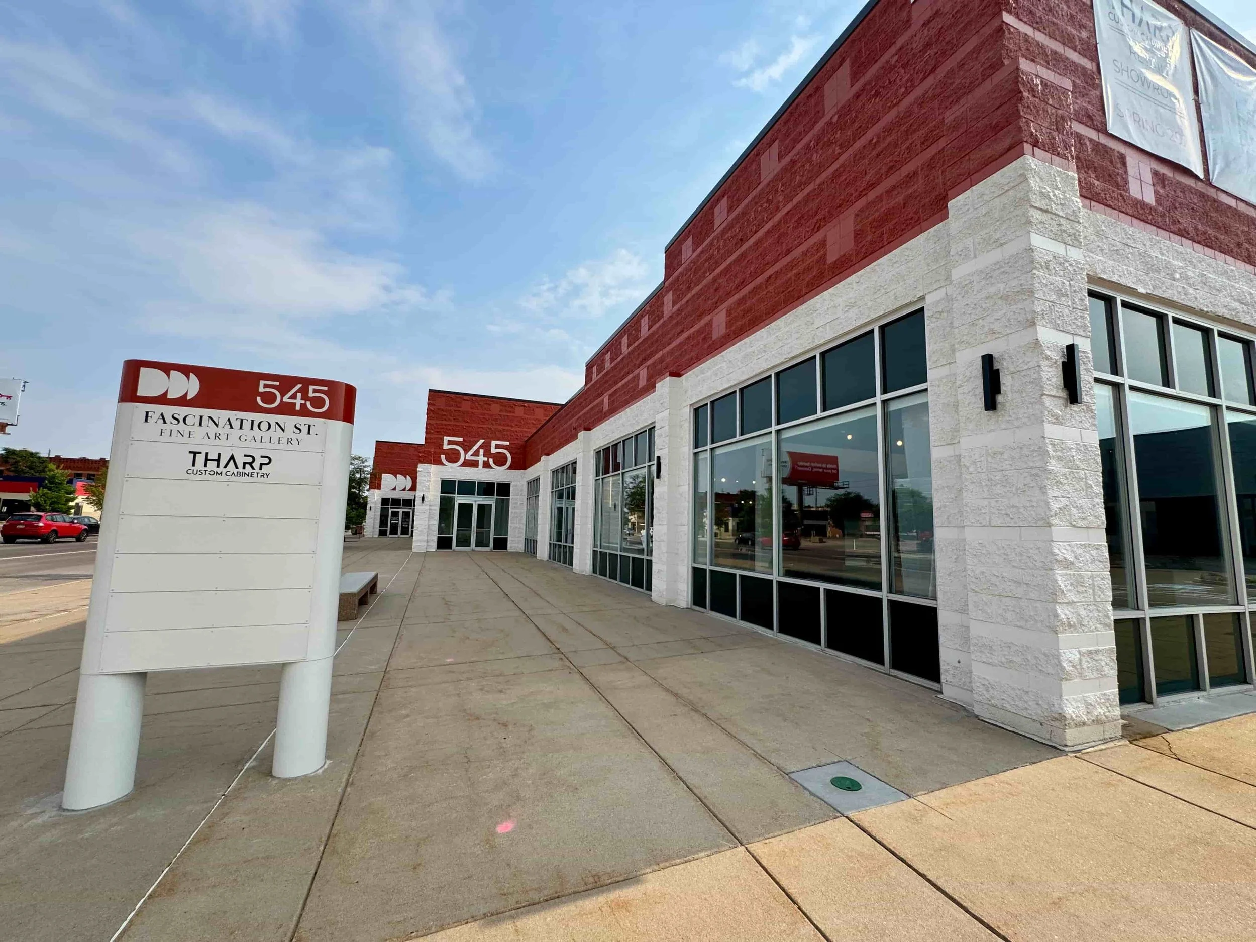 exterior of 545 south broadway with sign