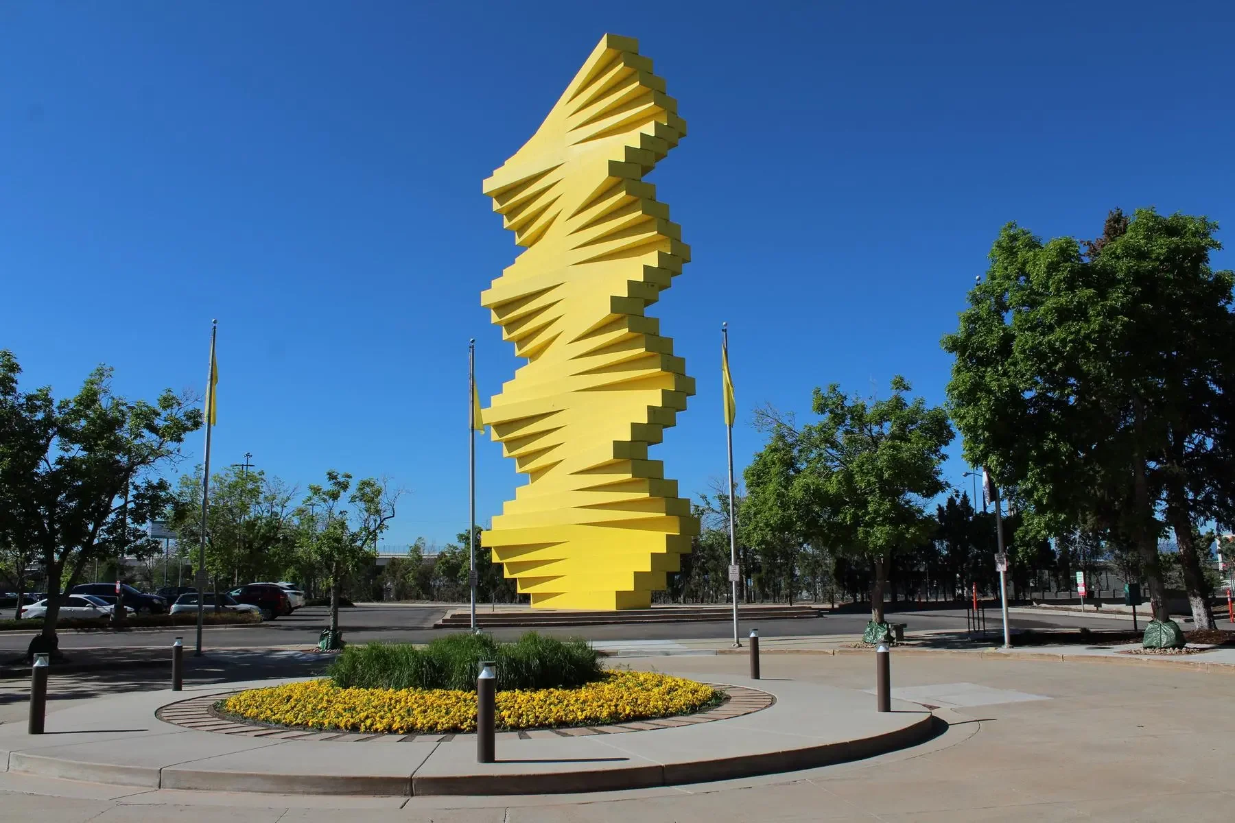 yellow articulated wall statue