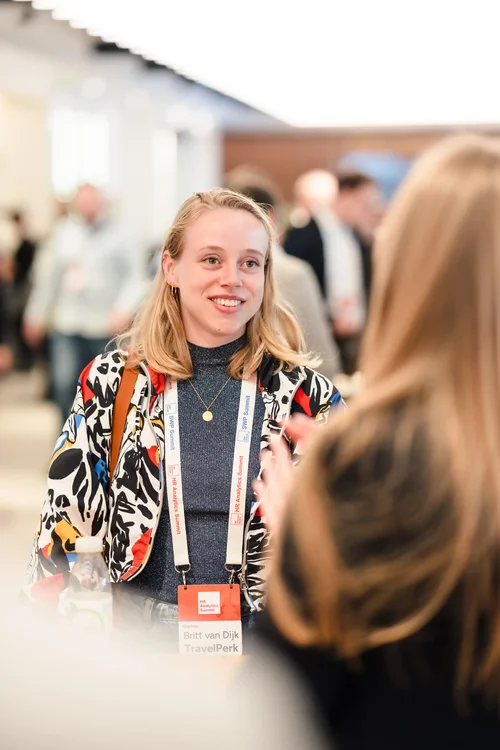 A delegate sharing ideas with peers at HR Analytics Summit