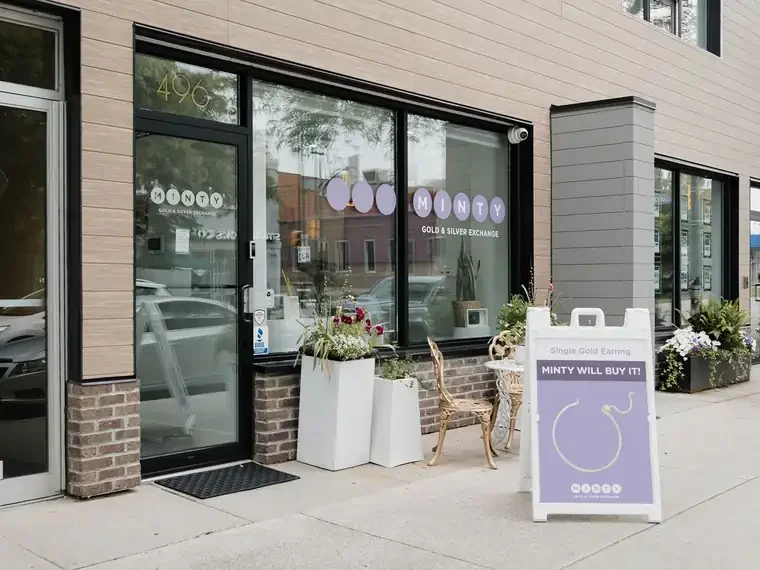 The MINTY storefront on Brant St with a sidewalk sign out front