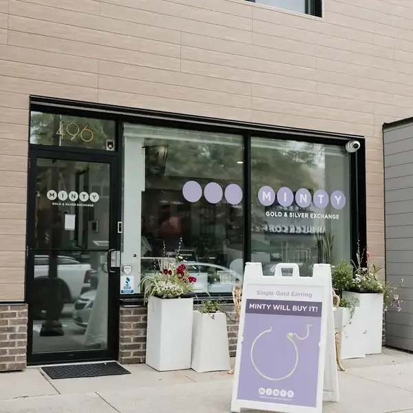 The MINTY storefront at 496 Brant St with a sidewalk sign out front